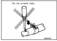  To reinstall the rubber hose securely, check that hose insertion