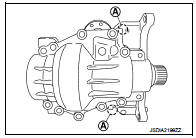 4. Tap the outer race of drive pinion bearing from transfer case with
