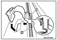 9. Remove fuel filler lid opener cable fixing clips, and then remove fuel
