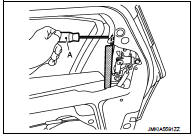 9. Remove lower sash (rear) from the rear door panel.