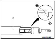 c. Press down body portion (A) of injector remover [SST: