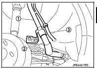 9. Remove EVAP canister hose (1) at front side of fuel tank (2).