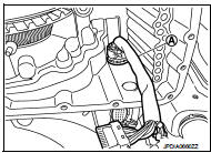 17. Remove the lip seal (1) from the transaxle case.