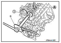 5. Install timing chain and related parts. Refer to EM-67, "Exploded View".