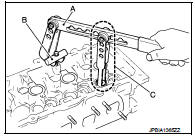5. Remove valve spring retainer and valve spring (with valve spring seat).