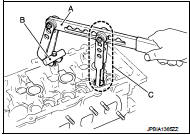 4. Remove valve spring retainer and valve spring (with valve spring seat).