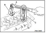 8. Install valve lifter.