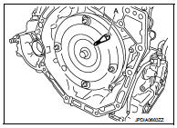 • Rotate the crankshaft so that the drive plate location guide insert