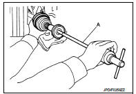 13. Remove circular clip (1) from shaft.
