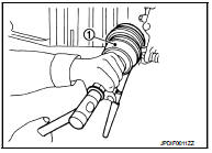 9. Install the boot securely into grooves (indicated by * marks)