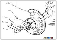 8. Remove wheel hub lock nut.