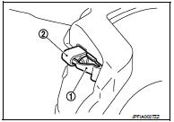 6. Install the lower sliding pin bolt and tighten it to the specified