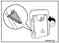 3. Open seatback fastener (A) and remove seatback retainer
