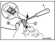 3. Remove metal clips.