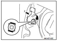 4. Disengage fuel filler lid opener cable (1). Remove fuel filler lid