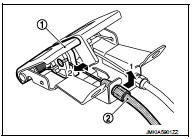 5. Remove grommet on the lower dash, and pull the hood lock control cable