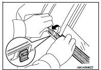 3. Slide rear door outside molding (1) toward vehicle front, and