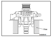 3. Remove alternator pulley, using alternator pulley adaptor [SST].