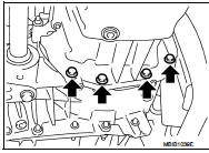 10. Support the engine bottom of the oil pan with a transmission jack