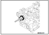 6. Install the cover (E) and the collar nut (F) of Tool KV113B0230
