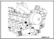 12. Install the exhaust manifold with new gasket. Tighten the bolts in