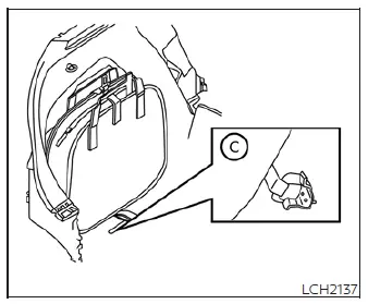 Placing the coiled cable and EVSE into the storage case