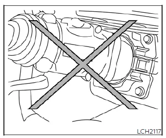 Aligning and inserting the high-capacity quick charge connector into the Nissan Leaf