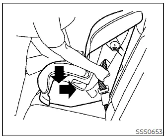 Applying knee pressure to the child restraint while tightening the seat belt