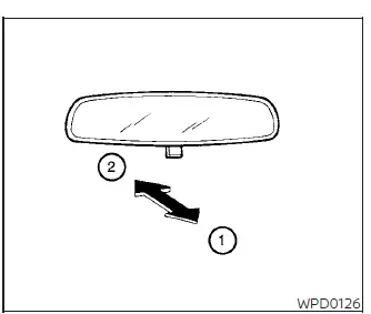 Adjusting the manual anti-glare day-night toggle tab at the base of the center rearview mirror
