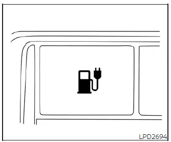 Location of the charge port lid release switch on the lower instrument panel of the Nissan Leaf