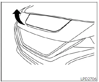 The front charge port lid unlatching and springing open on the nose of the Nissan Leaf