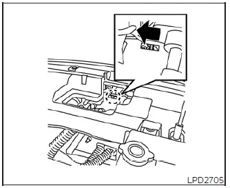 Manual mechanical release method for the charge port lid located inside the front motor compartment