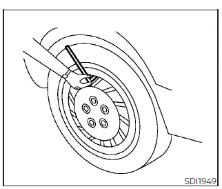 Detailed view of the Tire and Loading Information label highlighting pressure specifications for the Nissan Leaf