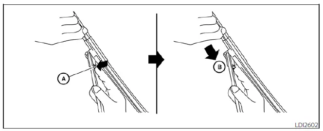 Detailed view of the release tab mechanism on the Nissan Leaf wiper blade assembly