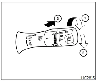 Rear wiper and washer control switch on the Nissan Leaf dashboard